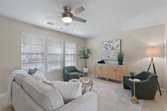 401 Buttercup Creek Blvd Unit 1005, Cedar Park, TX 78613 - living room featuring a ceiling fan, baseboards, and tile patterned floors