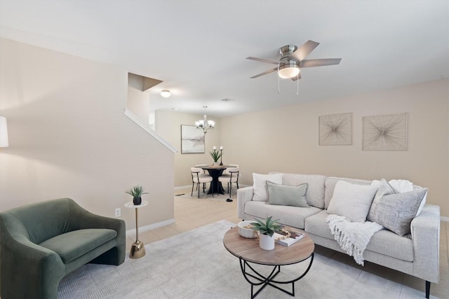 401 Buttercup Creek Blvd Unit 1005, Cedar Park, TX 78613 - living room featuring a chandelier, a ceiling fan, baseboards, and light tile patterned floors