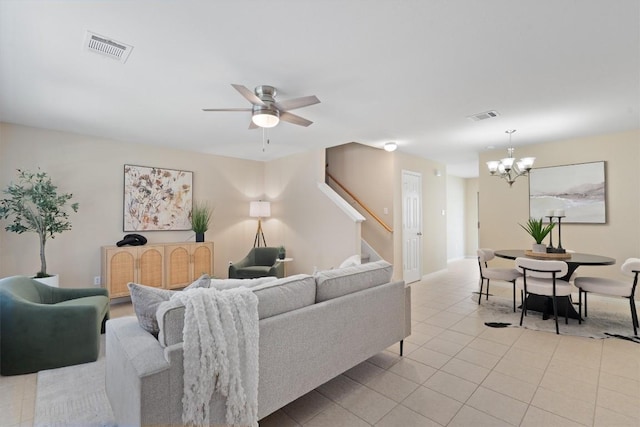 401 Buttercup Creek Blvd Unit 1005, Cedar Park, TX 78613 - living area with stairs, a chandelier, a ceiling fan, and light tile patterned flooring