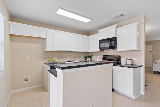 401 Buttercup Creek Blvd Unit 1005, Cedar Park, TX 78613 - kitchen featuring black appliances, dark countertops, light tile patterned flooring, backsplash, and white cabinets