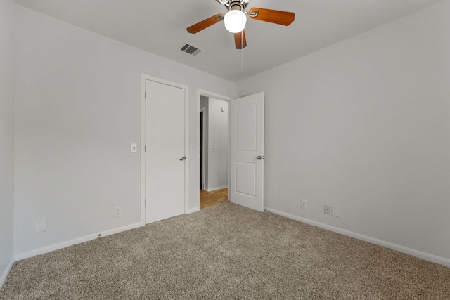 118 Cassandra Dr, Hutto, TX 78634 - spare room with carpet, ceiling fan, and baseboards