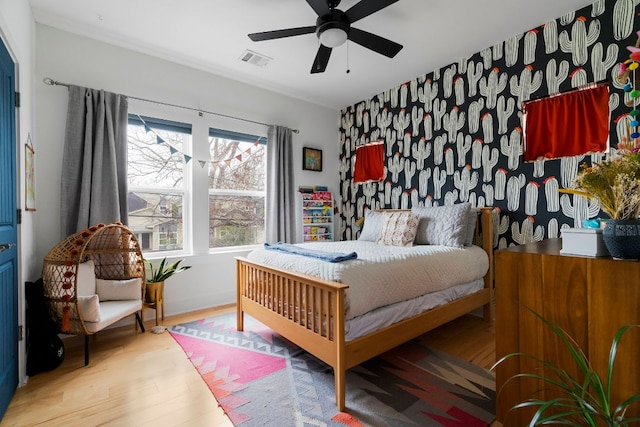 2912 Govalle Ave Unit A, Austin, TX 78702 - bedroom featuring wood finished floors and a ceiling fan