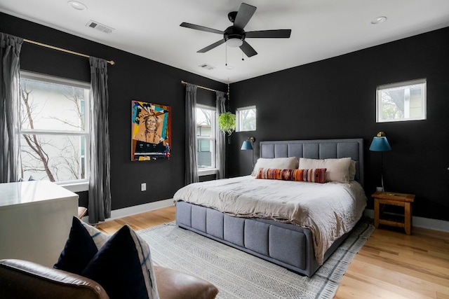 2912 Govalle Ave Unit A, Austin, TX 78702 - bedroom with light wood-type flooring, a ceiling fan, and recessed lighting