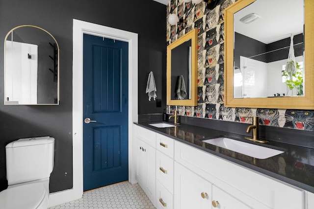 2912 Govalle Ave Unit A, Austin, TX 78702 - bathroom with double vanity, tile patterned flooring, and a shower