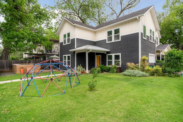 2912 Govalle Ave Unit A, Austin, TX 78702 - rear view of house featuring a jacuzzi and board and batten siding