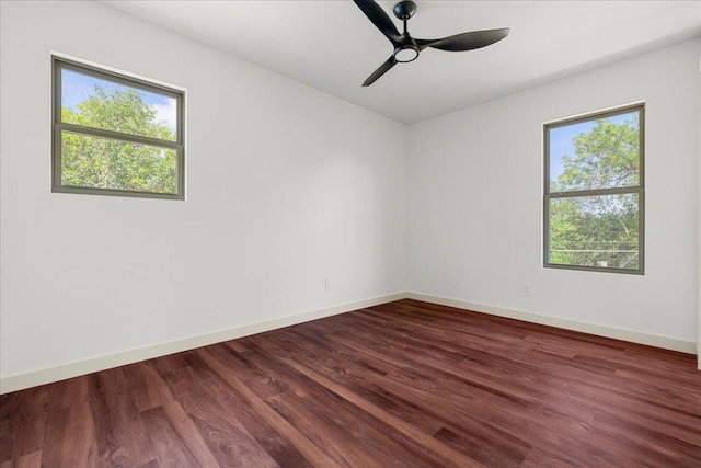 3605 Tallison Ter, Austin, TX 78704 - unfurnished room with healthy amount of natural light, dark wood finished floors, and a ceiling fan