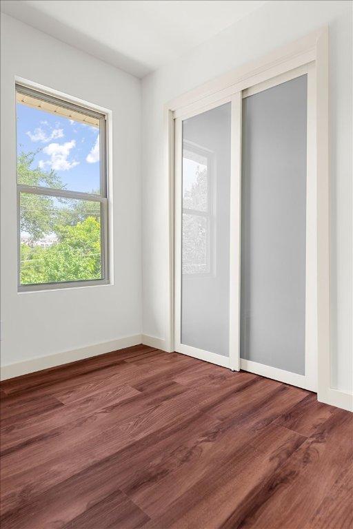 3605 Tallison Ter, Austin, TX 78704 - unfurnished bedroom with wood finished floors and a closet