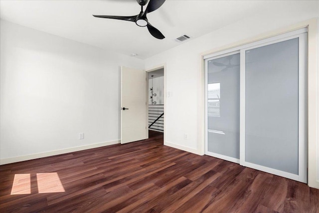3605 Tallison Ter, Austin, TX 78704 - unfurnished bedroom with wood finished floors, a closet, and ceiling fan