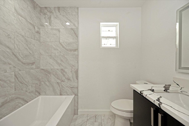 710 E 2nd St, Elgin, TX 78621 - bathroom featuring marble look tile flooring, vanity, and tub / shower combination