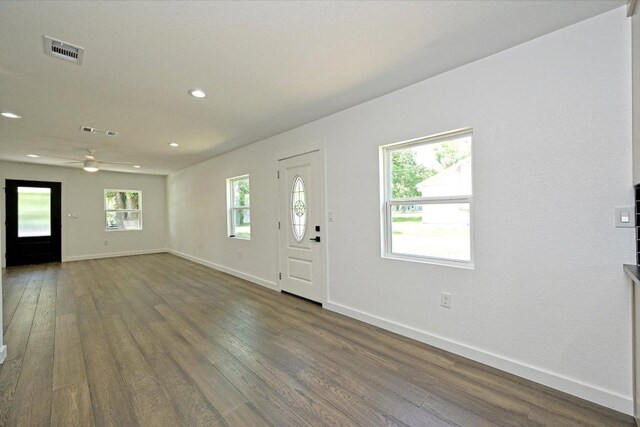 710 E 2nd St, Elgin, TX 78621 - entryway with dark wood finished floors, plenty of natural light, recessed lighting, and ceiling fan