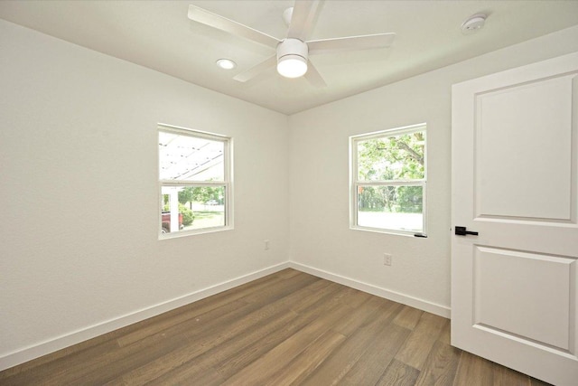 710 E 2nd St, Elgin, TX 78621 - spare room featuring a smoke detector, dark wood finished floors, a ceiling fan, and recessed lighting