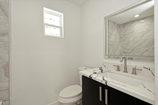710 E 2nd St, Elgin, TX 78621 - bathroom with toilet and vanity