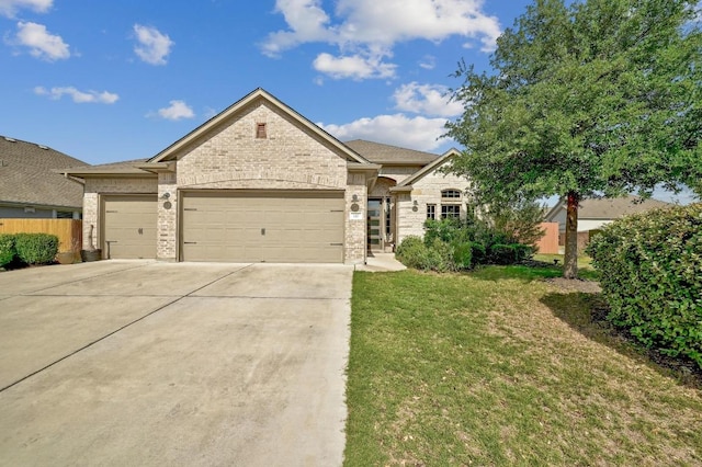 110 N Sage Holw, Dripping Springs, TX 78620 - view of front facade with concrete driveway and a garage