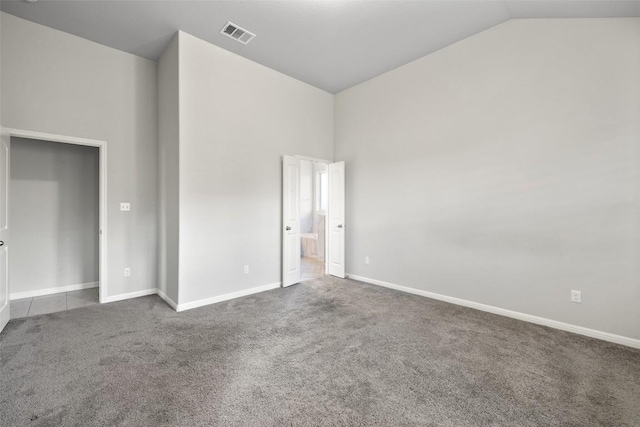 110 N Sage Holw, Dripping Springs, TX 78620 - unfurnished bedroom with carpet and high vaulted ceiling