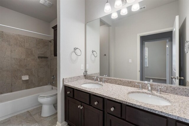 110 N Sage Holw, Dripping Springs, TX 78620 - bathroom with double vanity, shower / bathtub combination, and tile patterned floors