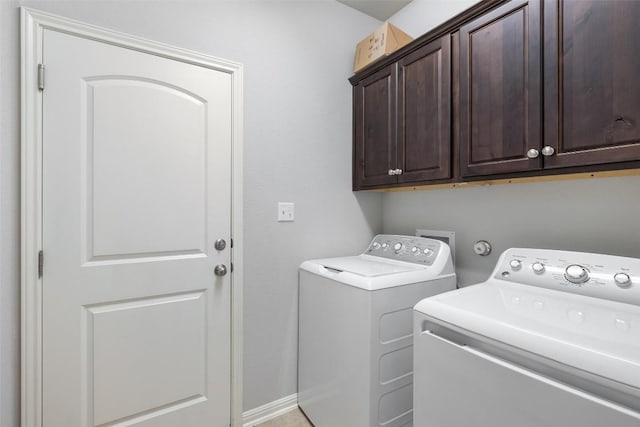 110 N Sage Holw, Dripping Springs, TX 78620 - washroom featuring cabinet space and separate washer and dryer