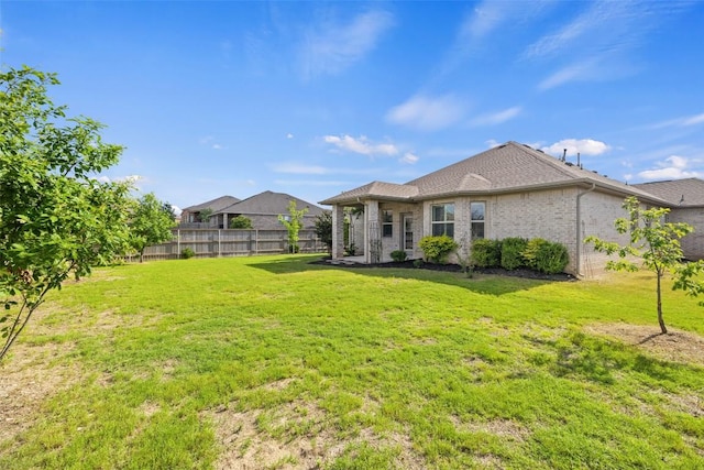 110 N Sage Holw, Dripping Springs, TX 78620 - rear view of house with brick siding