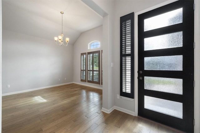 110 N Sage Holw, Dripping Springs, TX 78620 - entrance foyer featuring a chandelier, wood finished floors, and lofted ceiling