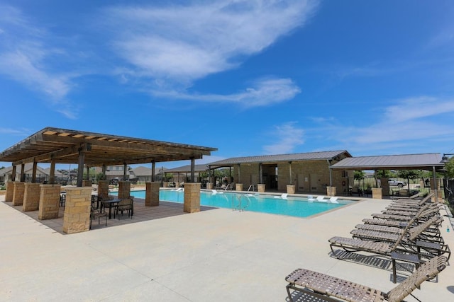 200 Waterway Ave, Hutto, TX 78634 - community pool featuring a pergola and a patio