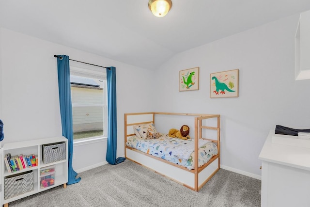 200 Waterway Ave, Hutto, TX 78634 - bedroom with lofted ceiling and carpet