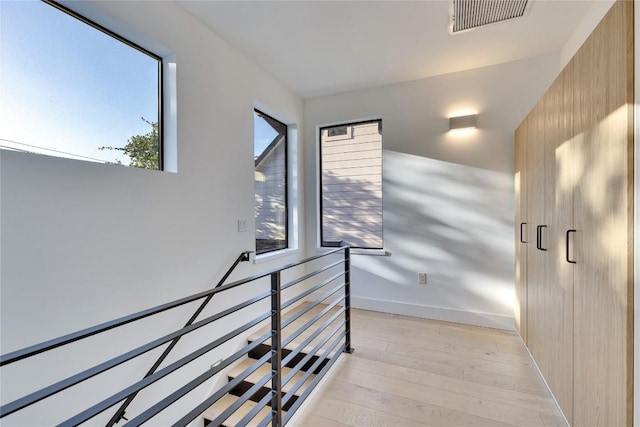 2901 S 5th St, Austin, TX 78704 - stairs featuring wood finished floors and baseboards