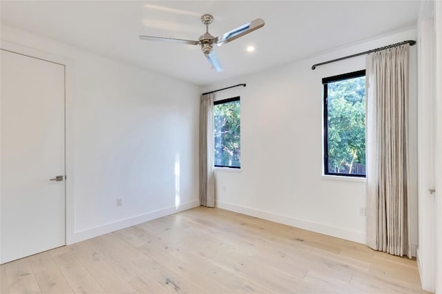 2901 S 5th St, Austin, TX 78704 - unfurnished room featuring a ceiling fan, light wood-type flooring, recessed lighting, and baseboards