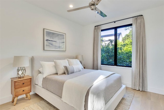 2901 S 5th St, Austin, TX 78704 - bedroom with light wood-style flooring, baseboards, ceiling fan, and recessed lighting