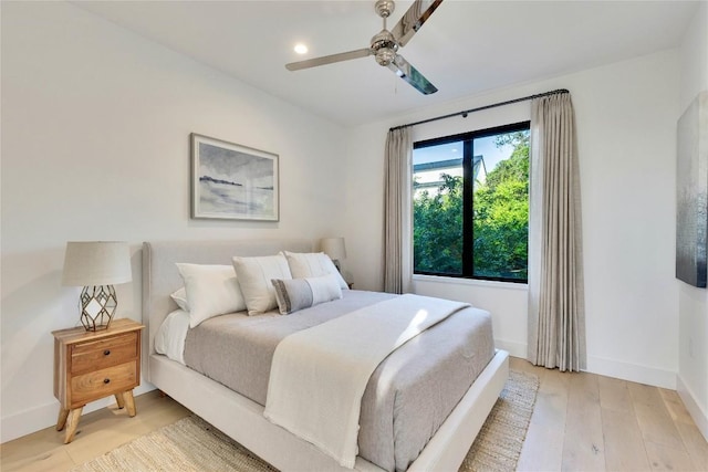 2901 S 5th St, Austin, TX 78704 - bedroom with light wood-type flooring, baseboards, ceiling fan, and recessed lighting