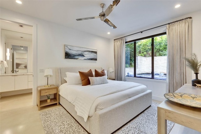 2901 S 5th St, Austin, TX 78704 - bedroom with recessed lighting, ceiling fan, ensuite bath, concrete floors, and baseboards