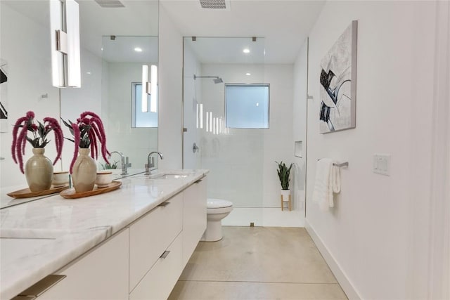 2901 S 5th St, Austin, TX 78704 - bathroom with toilet, a shower with door, concrete flooring, double vanity, and baseboards