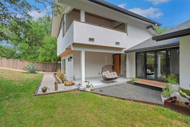 2502 Side Cv, Austin, TX 78704 - back of house with french doors, a patio, and stucco siding