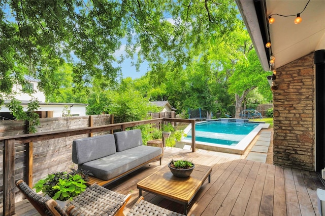 2502 Side Cv, Austin, TX 78704 - wooden deck with an outdoor living space and a fenced backyard