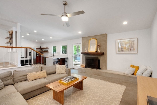 2502 Side Cv, Austin, TX 78704 - living area with recessed lighting, a ceiling fan, stairway, a fireplace, and vaulted ceiling
