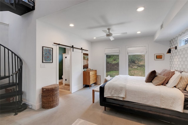 2502 Side Cv, Austin, TX 78704 - bedroom featuring a barn door, recessed lighting, light tile patterned floors, ceiling fan, and ensuite bath