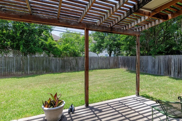 view of yard with a pergola and a patio