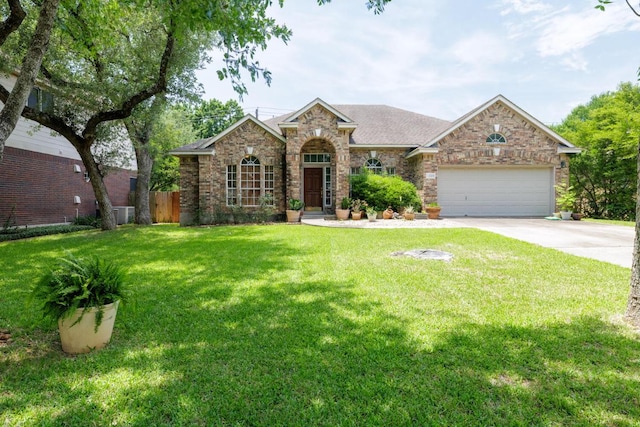 view of front of home with concrete driveway, an attached garage, a shingled roof, cooling unit, and brick siding
