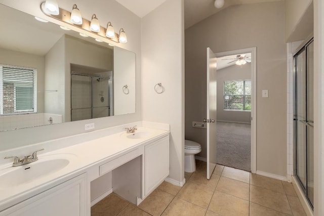 full bathroom featuring a stall shower, a ceiling fan, toilet, and lofted ceiling