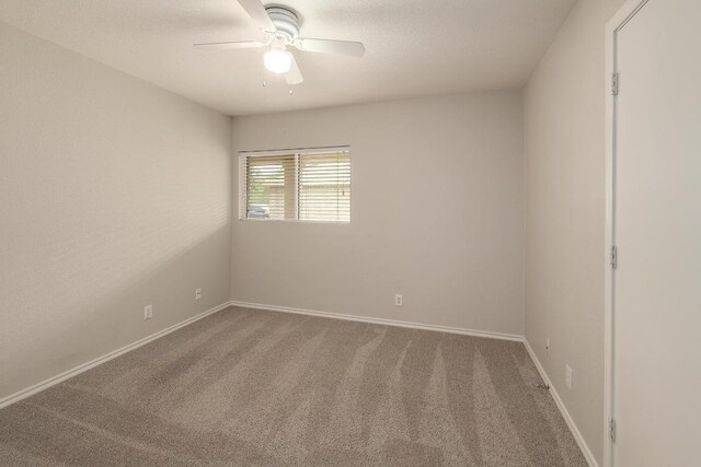 16710 Shipshaw River Dr, Leander, TX 78641 - empty room featuring carpet floors, ceiling fan, and baseboards