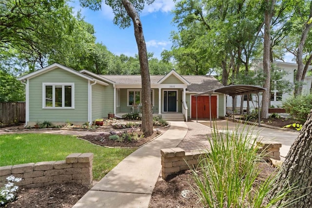 2601 W 49th St, Austin, TX 78731 - ranch-style home with driveway and a storage unit