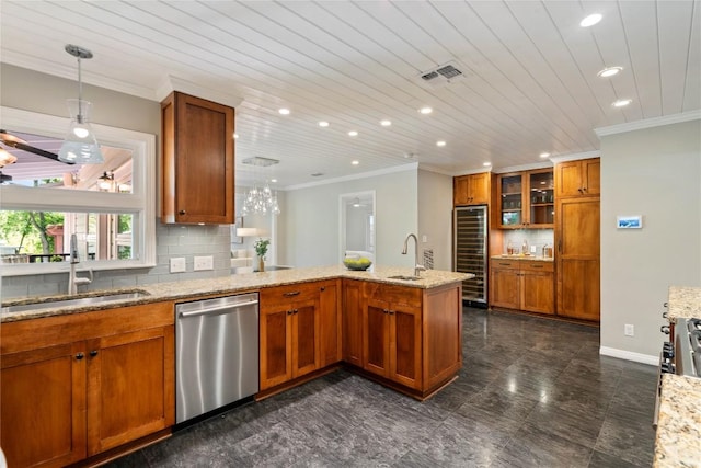 2601 W 49th St, Austin, TX 78731 - kitchen with dishwasher, beverage cooler, brown cabinetry, crown molding, and a peninsula