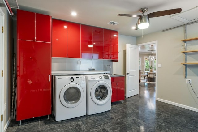 2601 W 49th St, Austin, TX 78731 - laundry room featuring cabinet space, a ceiling fan, and washer and dryer