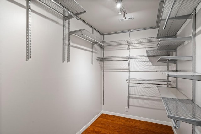 2601 W 49th St, Austin, TX 78731 - walk in closet with wood finished floors