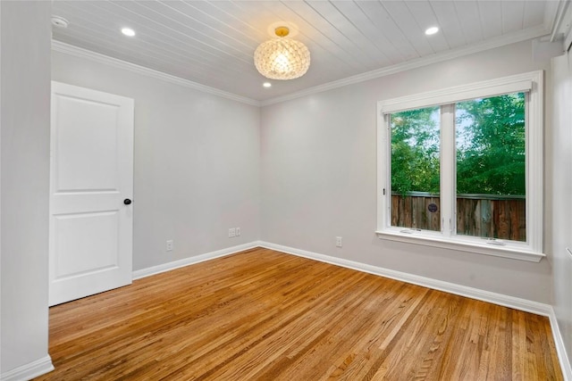 2601 W 49th St, Austin, TX 78731 - unfurnished room with light wood-type flooring, baseboards, recessed lighting, crown molding, and wooden ceiling