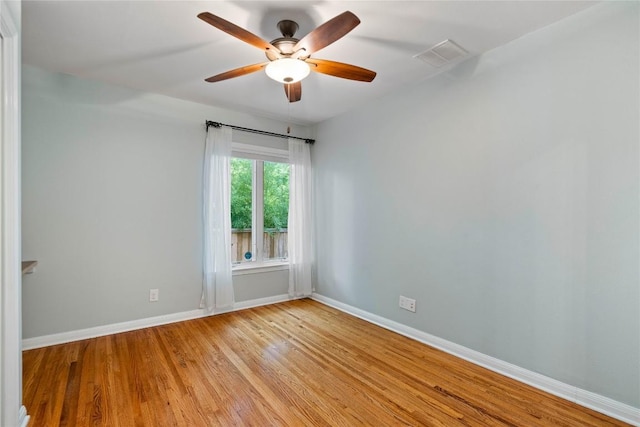 2601 W 49th St, Austin, TX 78731 - spare room with baseboards, light wood-style floors, and ceiling fan