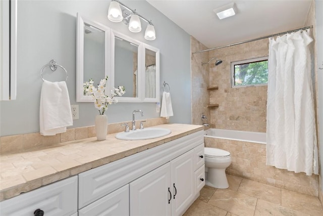 2601 W 49th St, Austin, TX 78731 - bathroom featuring tiled shower / bath combo, tile patterned flooring, vanity, and toilet