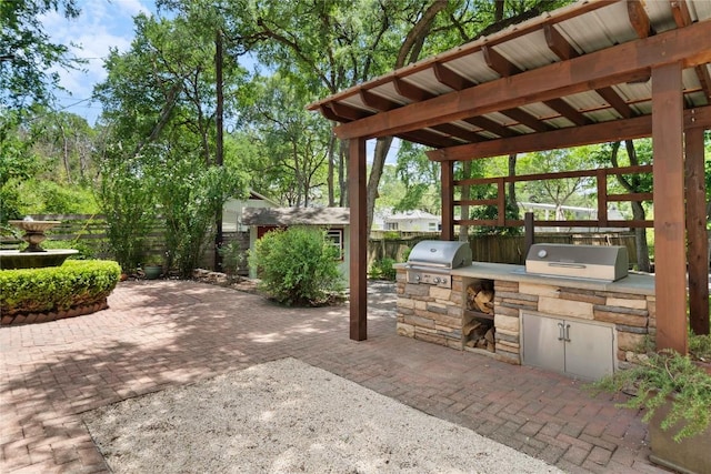 2601 W 49th St, Austin, TX 78731 - view of patio featuring a grill, fence, and area for grilling
