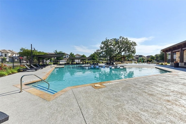 125 Redtail Ln, Leander, TX 78641 - community pool featuring a patio