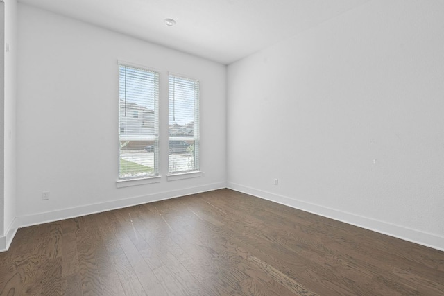 1616 Illawarra Way, Leander, TX 78641 - unfurnished room with dark wood-style floors and baseboards