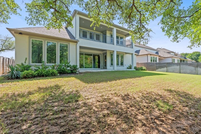 1616 Illawarra Way, Leander, TX 78641 - rear view of house with stucco siding and a balcony