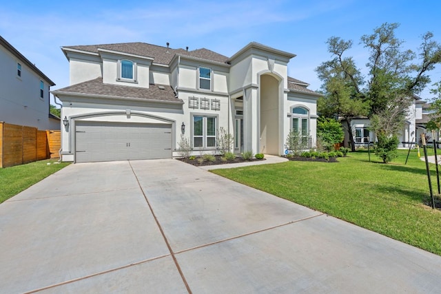 1616 Illawarra Way, Leander, TX 78641 - view of front of house with stucco siding, concrete driveway, and a shingled roof